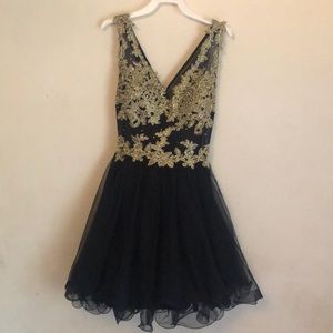 Navy blue w/ gold pattern knee-length formal dress